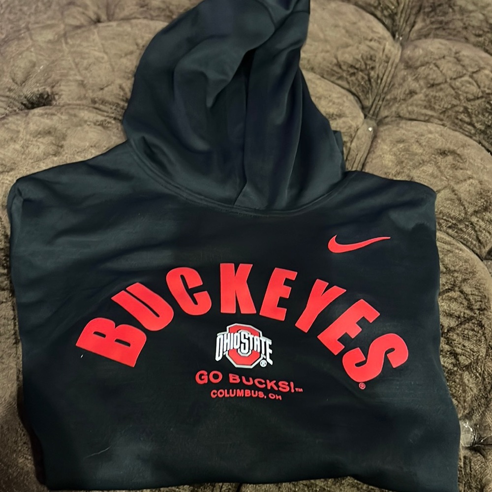 Nike Dri-Fit Ohio State Pullover.  Black with Red Ohio state.  Has a hood.